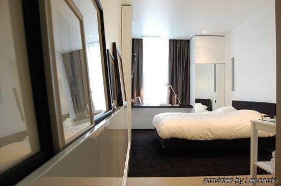 Hotel Les Nuits Антверпен Номер фото